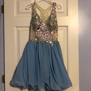 Junior size 2 party dress light blue wi/sequins.